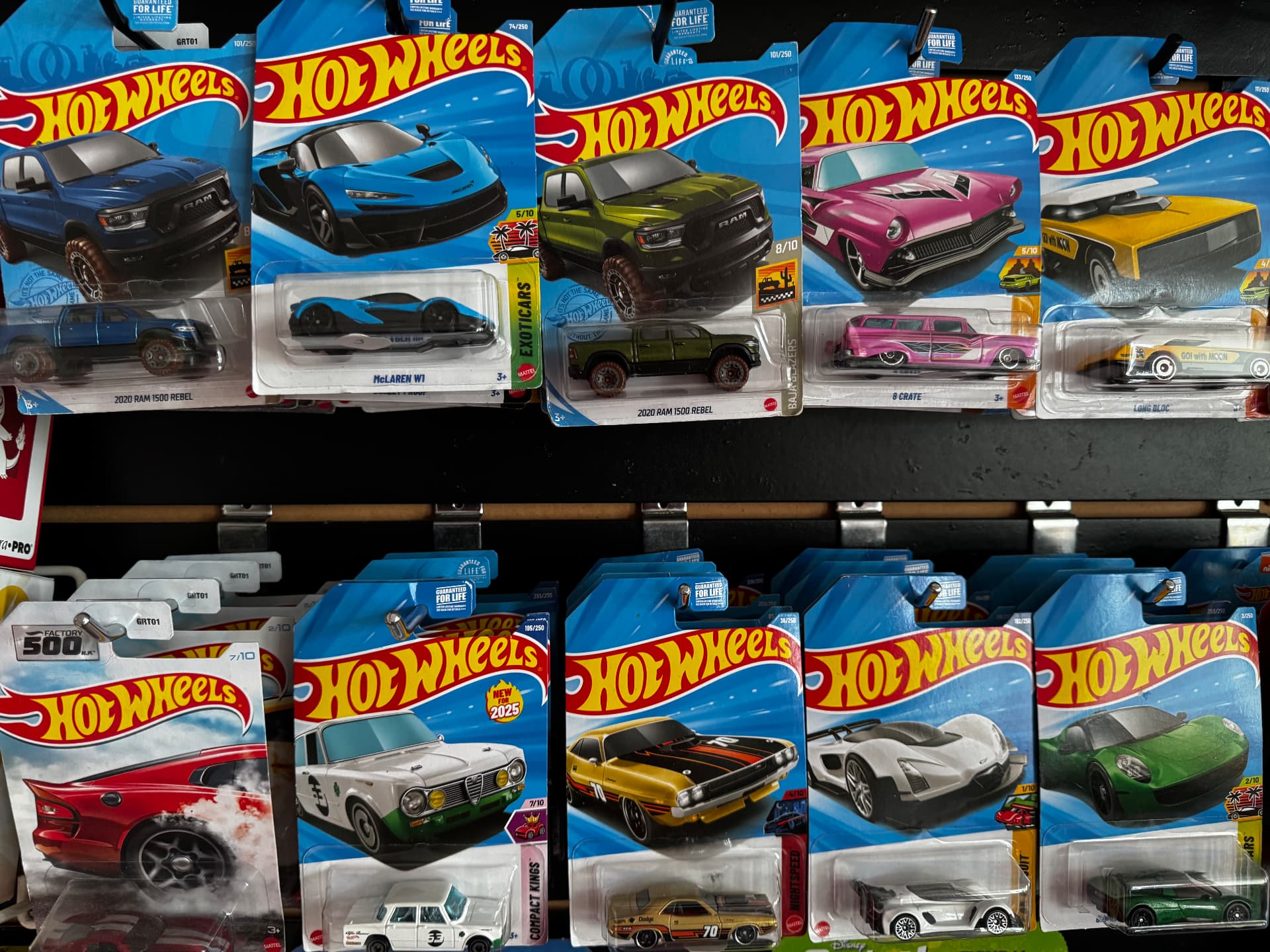 Hot Wheels die-cast cars on the collectibles rack