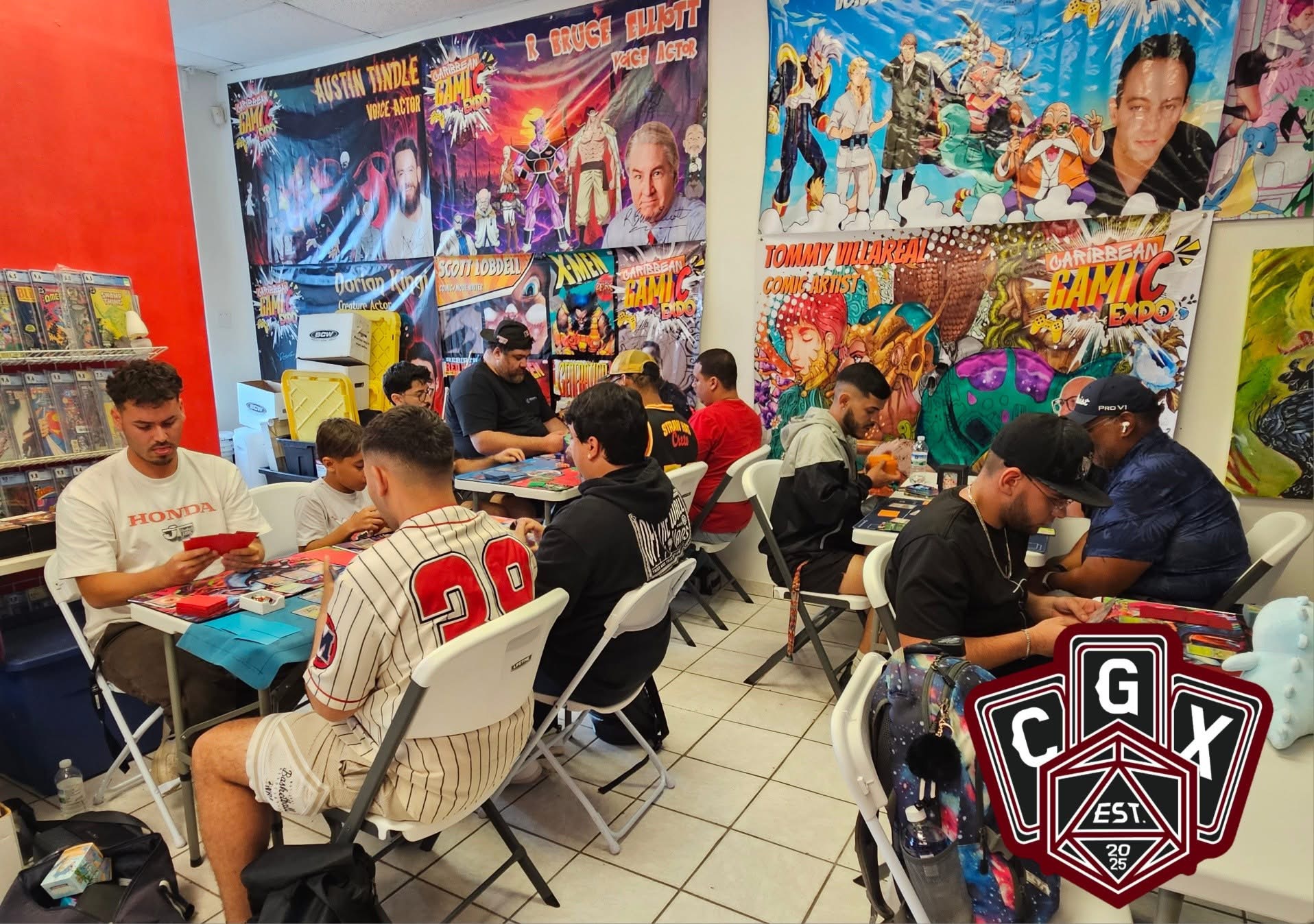 Players seated at tables battling with cards inside the CGX play space