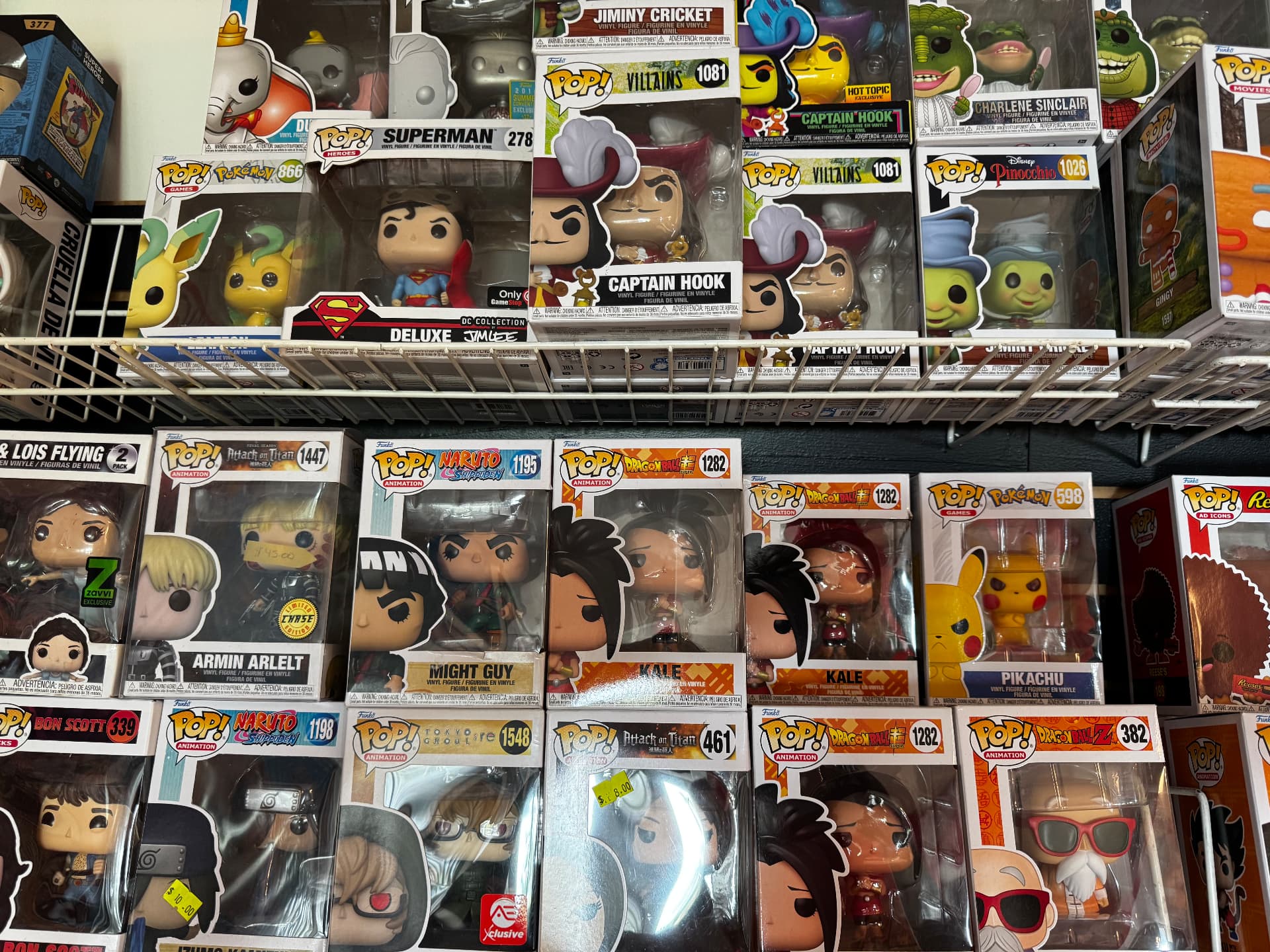 Wall of Funko Pop vinyl figures in the store